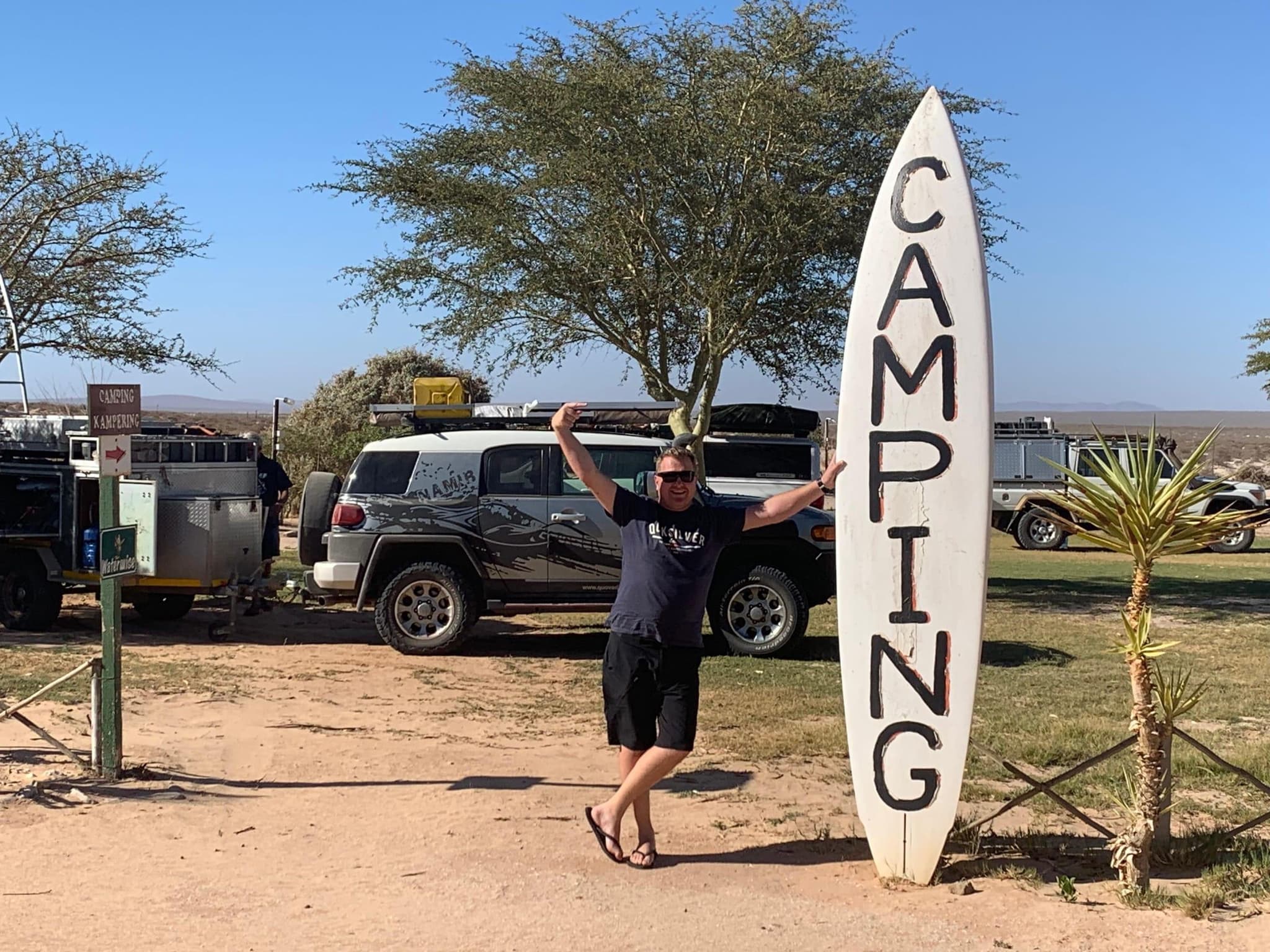 Camping signpost at the coastal campground