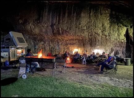 Cave campsite campfire evening gathering