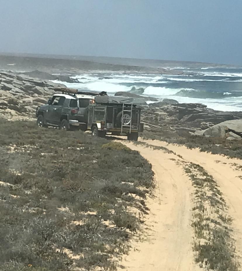 4x4 vehicle navigating the dramatic coastal sand tracks at Namakwa